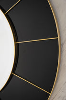 JMV Compass 35.5 inch mirror radiant gold and glossy black lifestyle close view